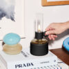 The Fatboy Flamtastique Oil Lamp XS brings a modern twist to classic outdoor lighting.